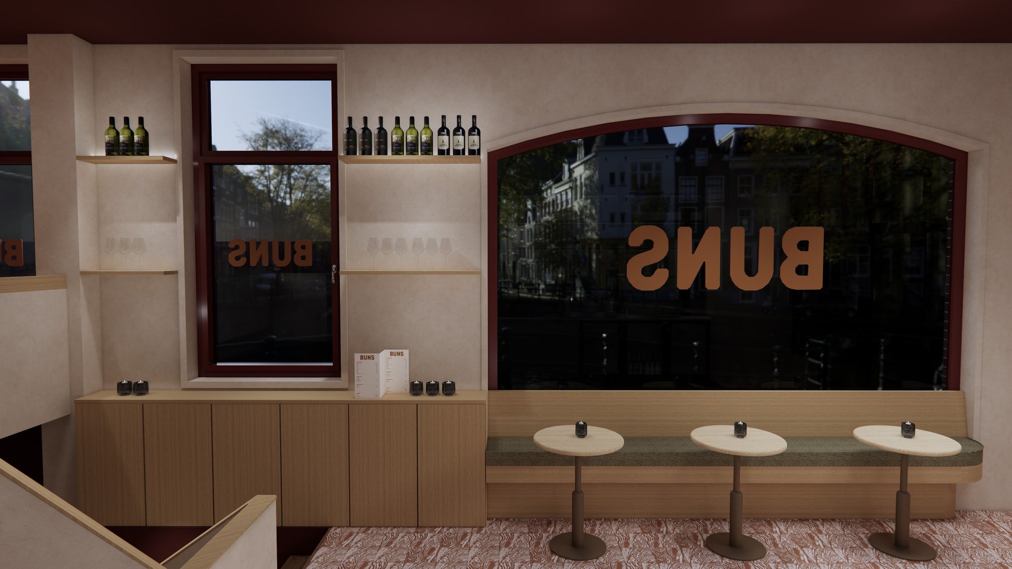 BUNS Amsterdam - raambank met kleine tafels en wijnschappen