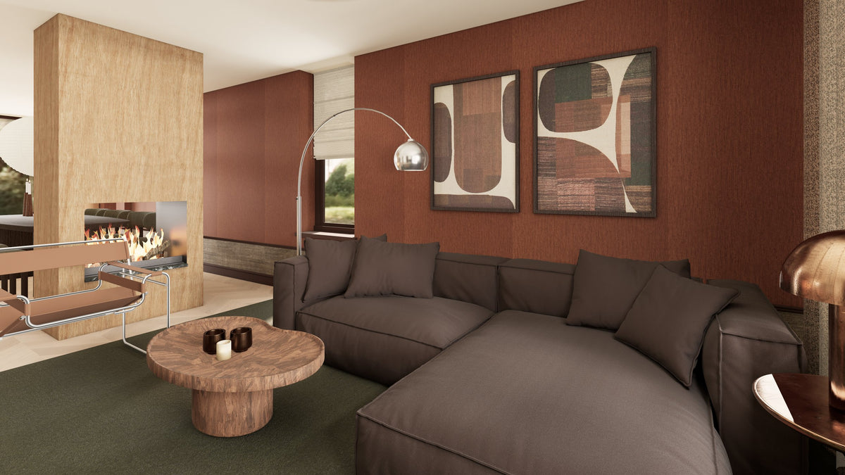 3D-render van een woonkamer met hoekbank, haard en terracotta wanden